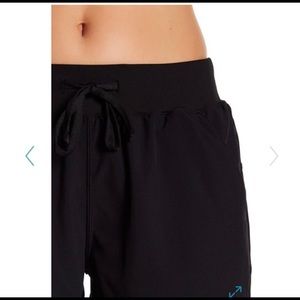 Black drawstring athletic shorts
